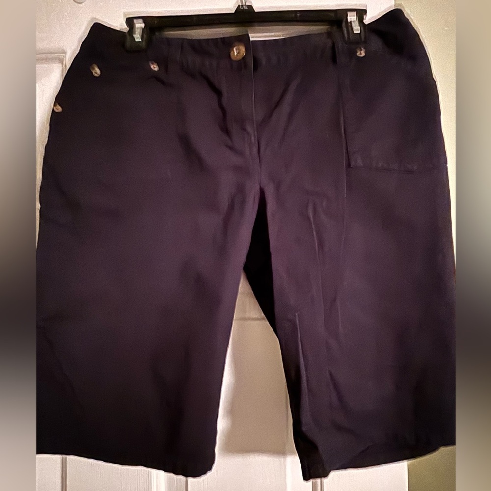 Great condition INC brand black knee length shorts. Size 8.